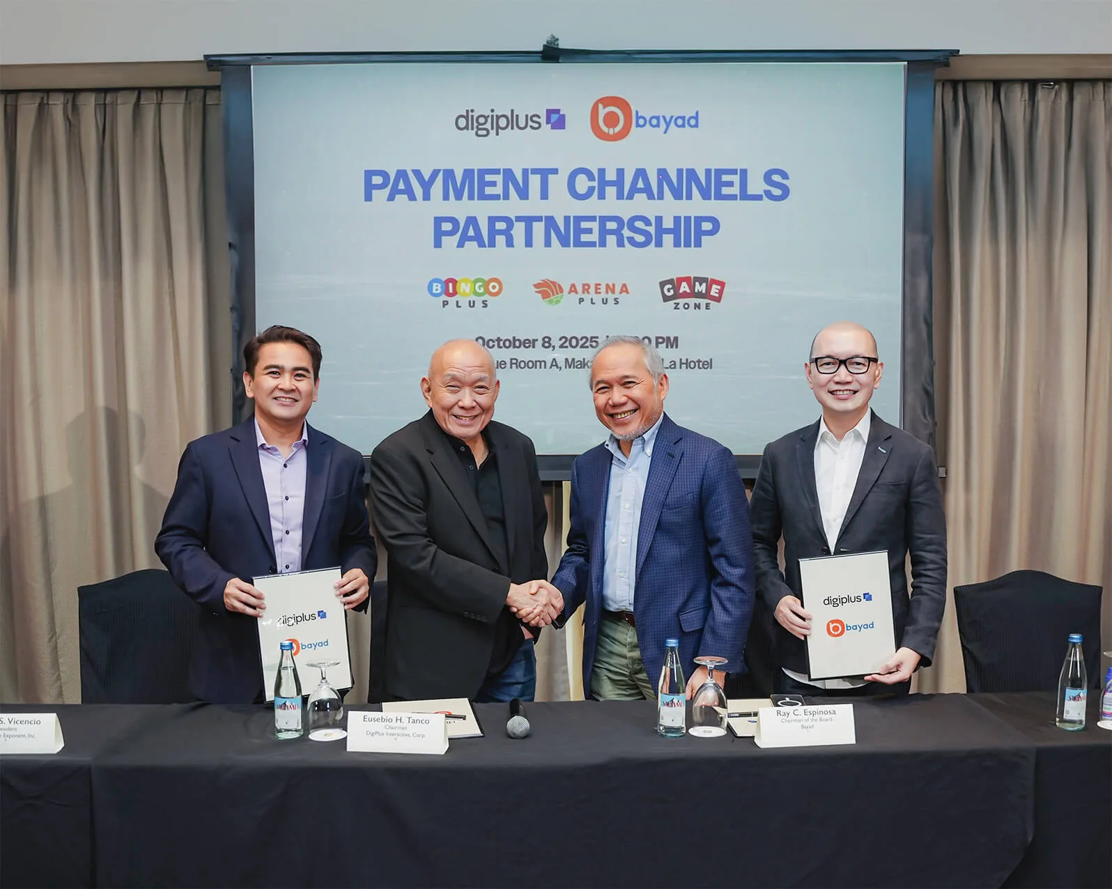 DigiPlus and Bayad executives shake hands at the Payment Channels Partnership signing, October 8, 2025