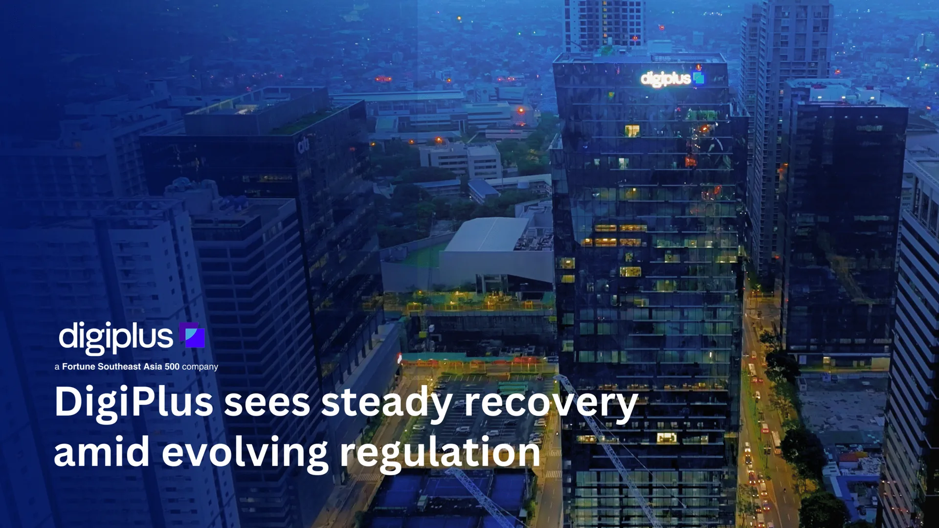 Key visual: aerial night view of the DigiPlus tower, DigiPlus sees steady recovery amid evolving regulation